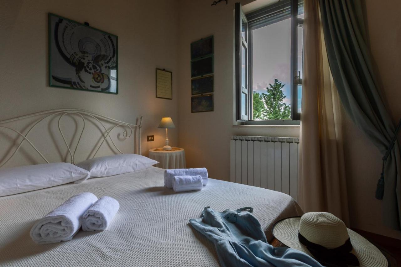 Tuscany Balcony: Crete Senesi Casetta Bagian luar foto